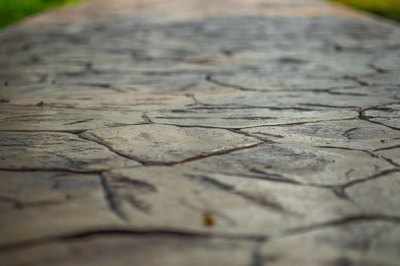 Close up view of walkway concrete stamped material